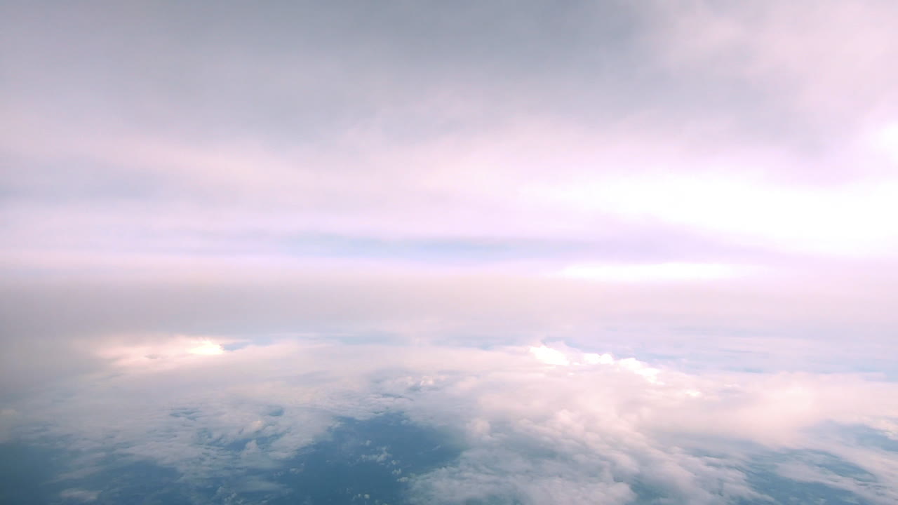Looking at the clouds and Da Nang city in the airplane in Asia.