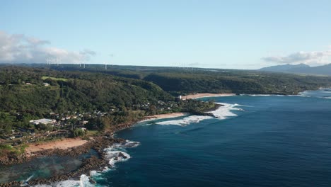 Wide-aerial-panning-shot-of-the-rugged-North-Shore-coastline-on-the-island-of-O'ahu,-Hawaii