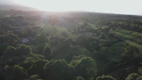 Scenic-sunset-over-farmland-landscape,-Loitokitok-village,-Kenya,-Africa,-aerial