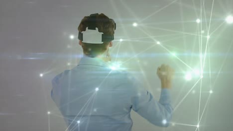 animation of network of connections over man wearing vr headset