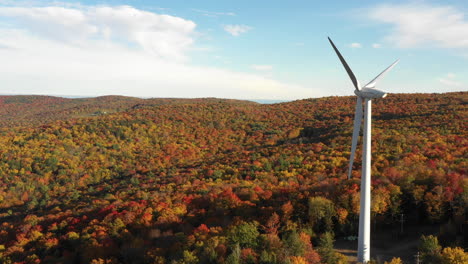 Windmill-turbine-wind-farm-aerial-during-beautiful-autumn-leaf-season-clean-energy