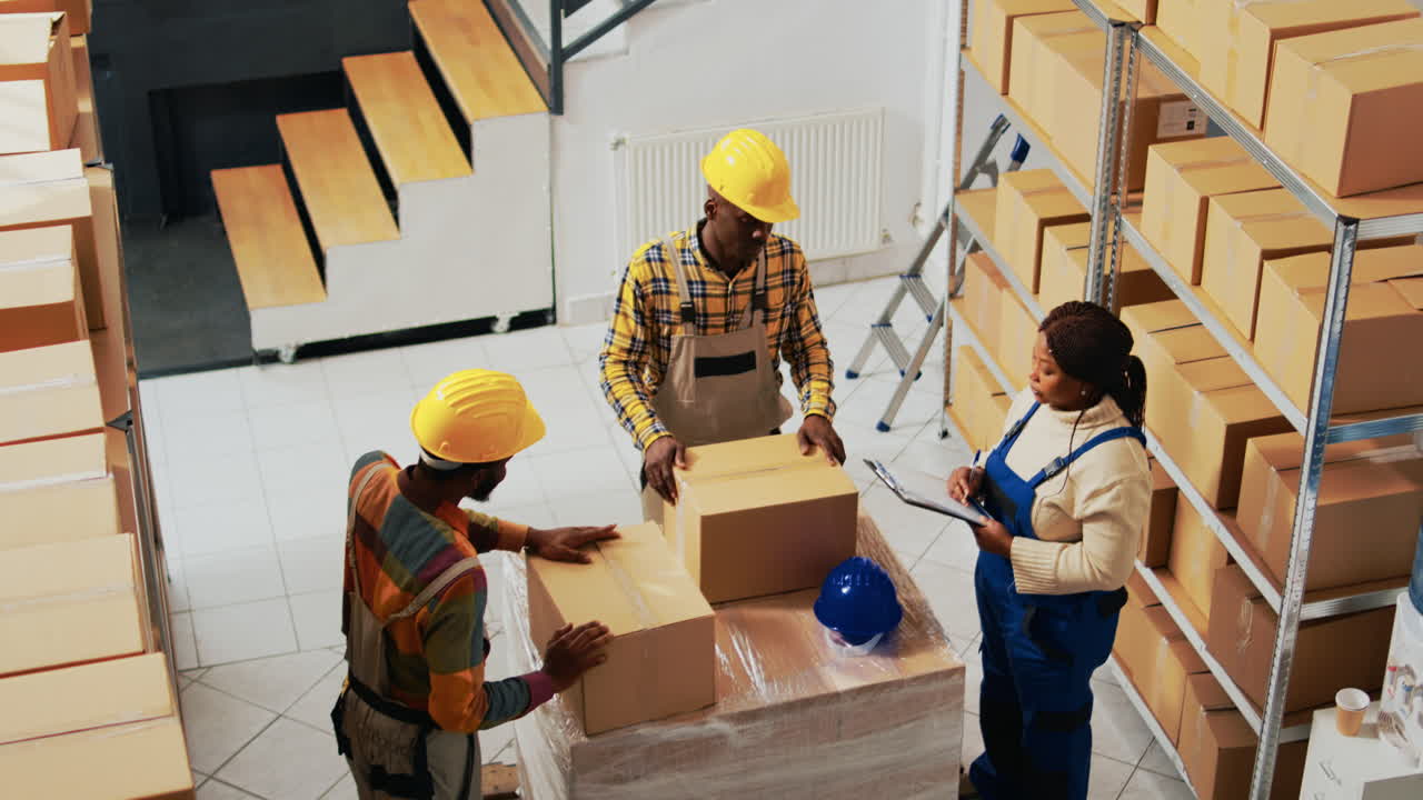 Warehouse workers handling boxes