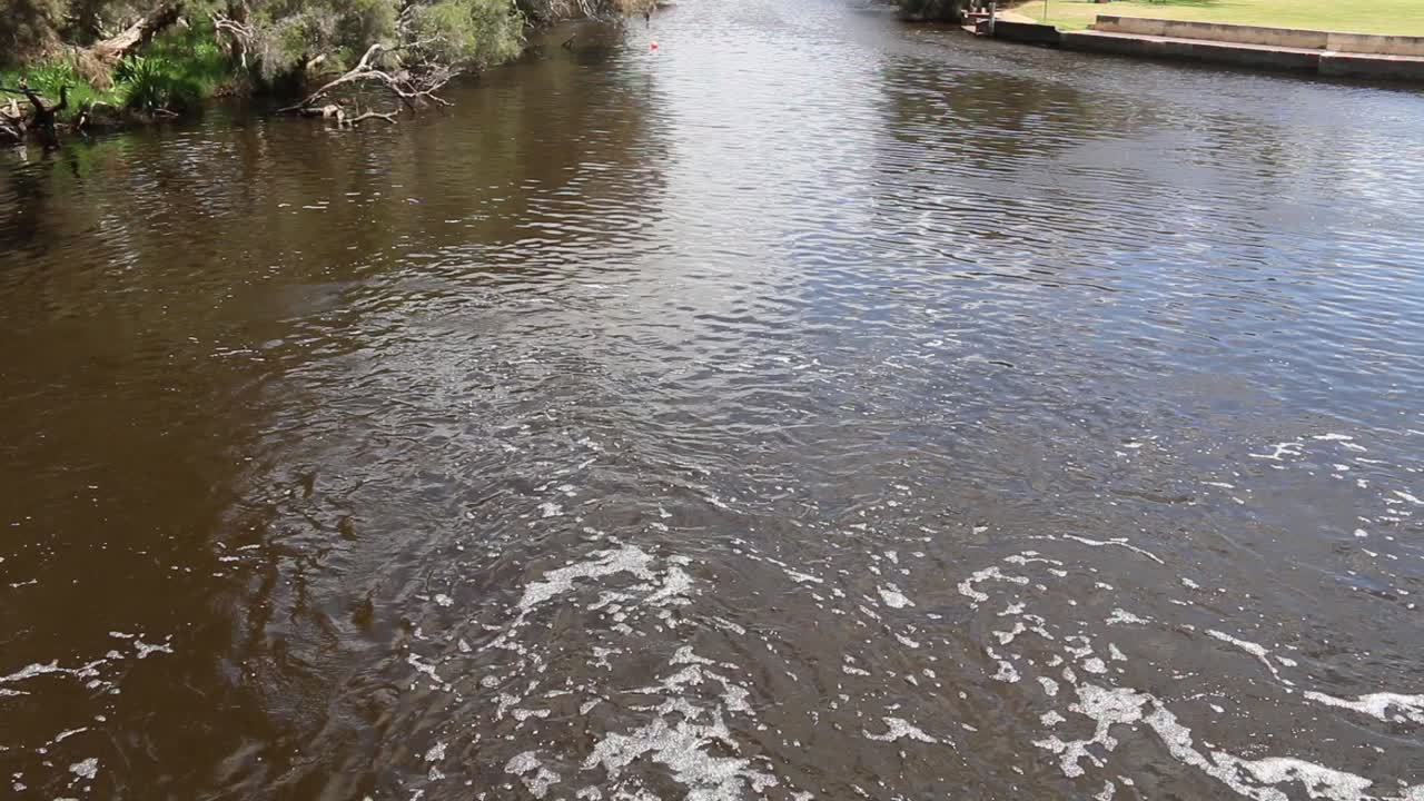 Flowing water from the weir, Canning river Perth WA.