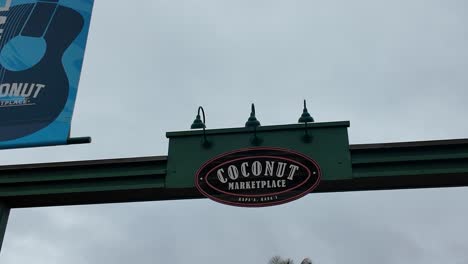 signboard of coconut marketplace in kapaa kauai hawaii, quaint open-air shopping village with stores, restaurants, coffeeshops and local art. coconut marketplace at kapaa on the island of kauai hawaii