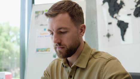 man working in a travel agency