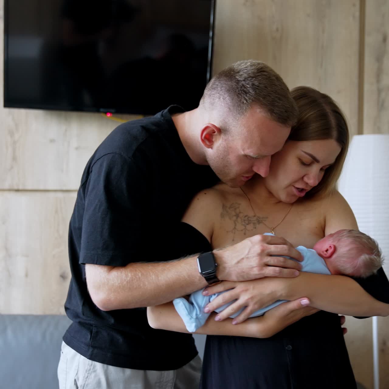 Infant family parenthood. Young parents with newborn baby