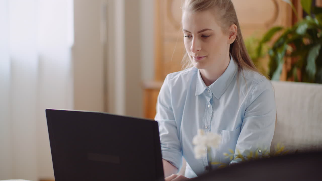 Woman Working On Computer Thinking And Solving Problem 5