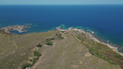mountainscape on the shores in chania, crete, greece. aerial drone shot