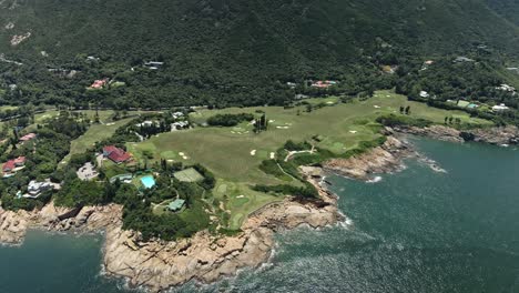 4K-Aerial-Drone-shot-of-Huge-Golf-Course-in-Shek-O-near-the-sea,-in-Hong-Kong