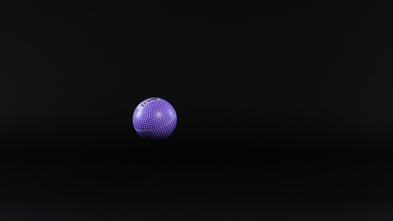 A purple ball bounces against a dark background