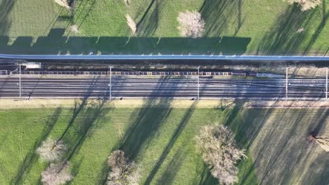 aerial view of train crossing zug tracks idyllic switzerland landscape