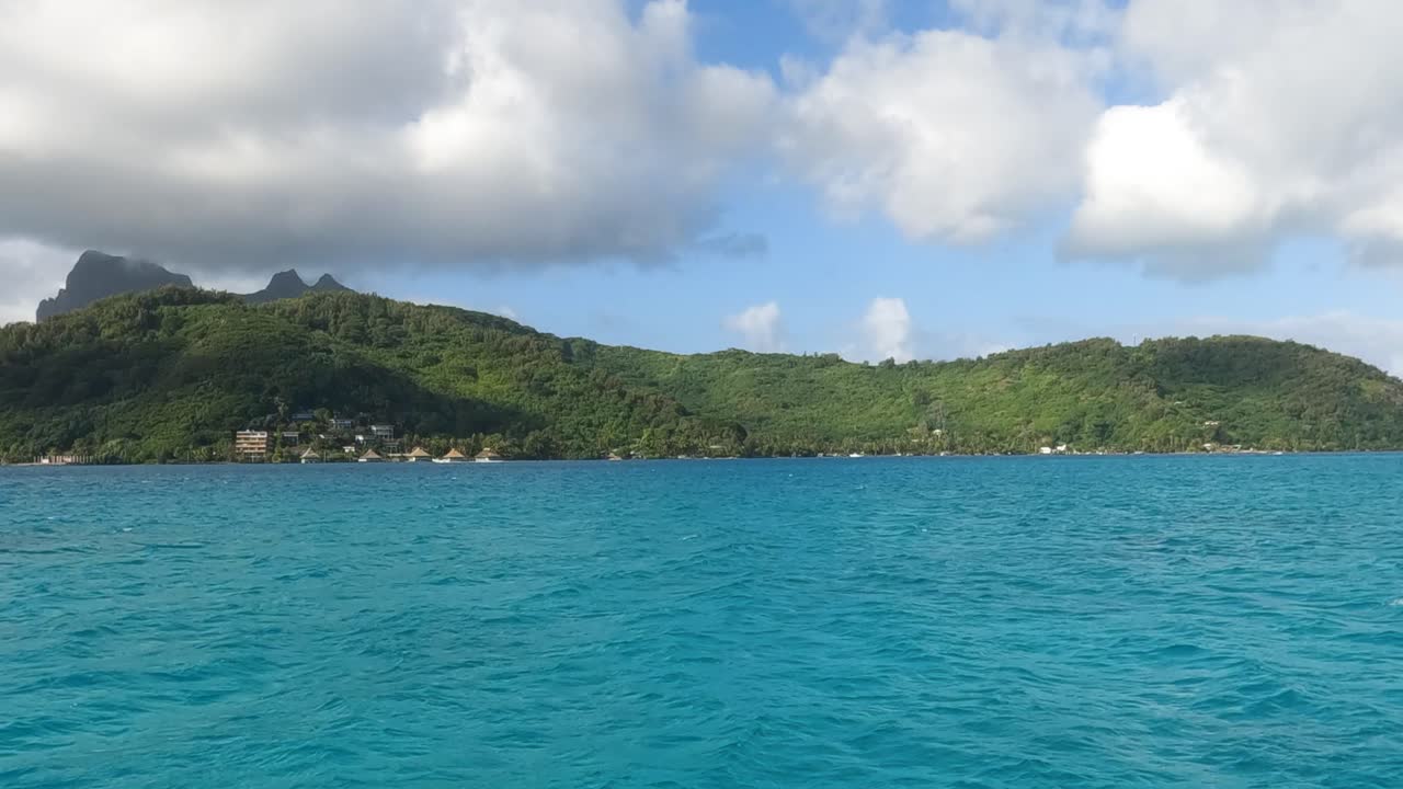Approaching to Bora Bora Island, French Polynesia, View From Boat Sailing in Lagoon 60fps