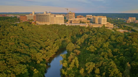 huron river in ann arbor, michigan, captured by a slowly moving drone in the summer season.