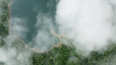 Clouds-Covering-A-Lagoon-In-Dense-Woodland-At-Lake-Danao-Natural-Park-On-Island-Of-Leyte,-Philippines