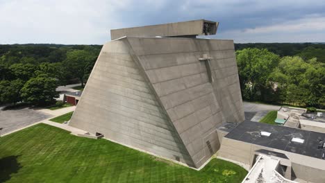 Storm-clouds-passing-over-the-brutalist-stone-structure-of-Saint-Francis-church