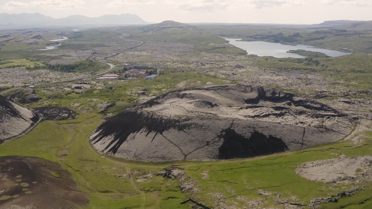 Aerial video circling Raudbrok crater near Lake Hre&eth;avatn in western Iceland