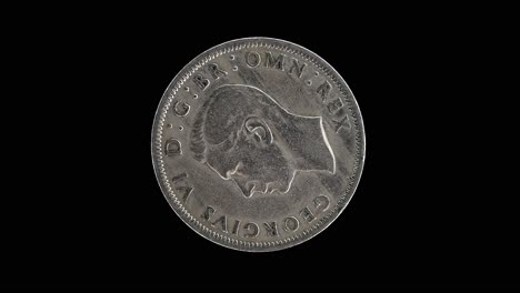 united kingdom 1949 half crown coin obverse with portrait of king george vi rotating on black background