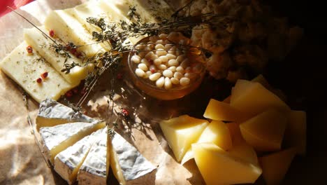 assorted cheese platter with honey and nuts