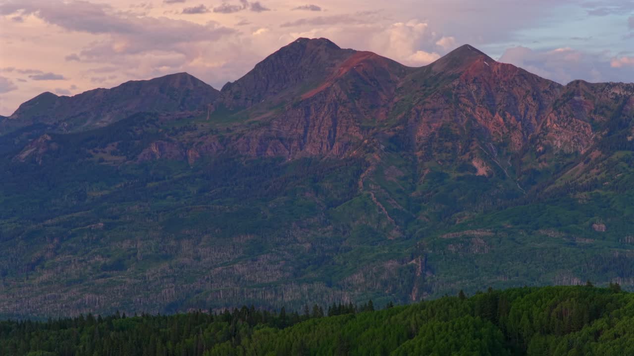 Marcellina Mountain Kebler Pass Lost Lake campground campsite vibrant sunset golden hour spring summer aerial drone Crested Butte Colorado Ruby Peak Paonia Gunnison National Forest parallax left