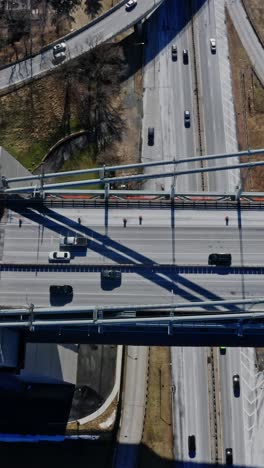 verrazano narrows bridge with passing cars and trucks