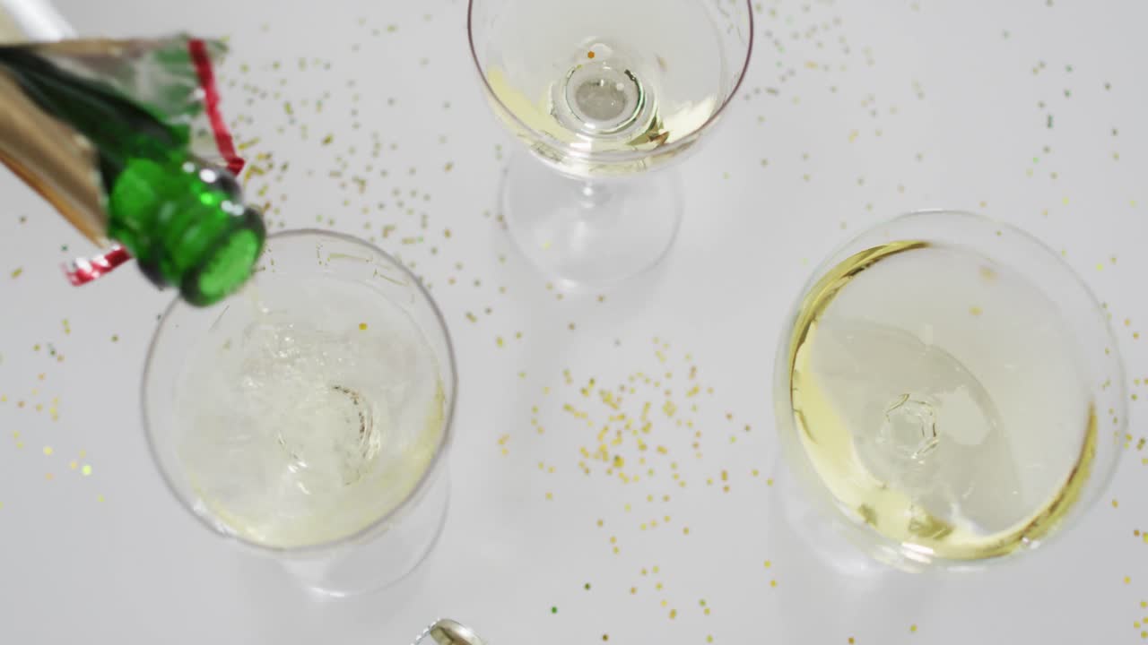 Champagne glasses on white background at new year's eve