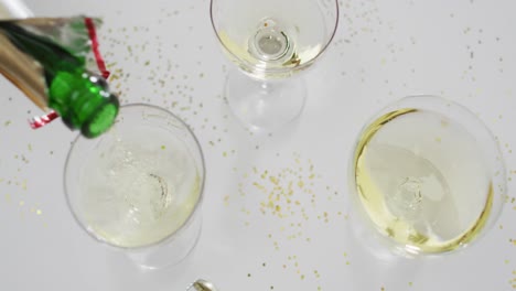 Champagne-glasses-on-white-background-at-new-year's-eve