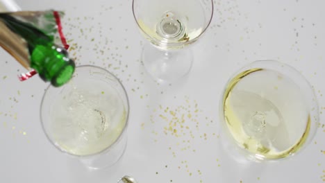 champagne glasses on white background at new year's eve