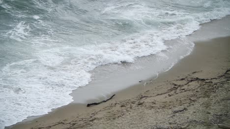 Wider-shot-of-turbulent-sea-shot-from-higher-level