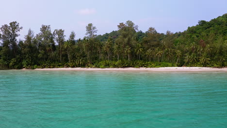 Turquoise-ocean-lagoon-with-Koh-Kood-palm-beach-paradise-in-Thailand