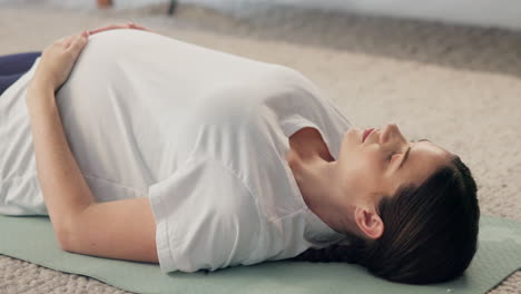 pregnant woman doing yoga