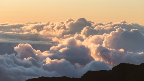 rolling clouds over hawaii at sunrise in 4k