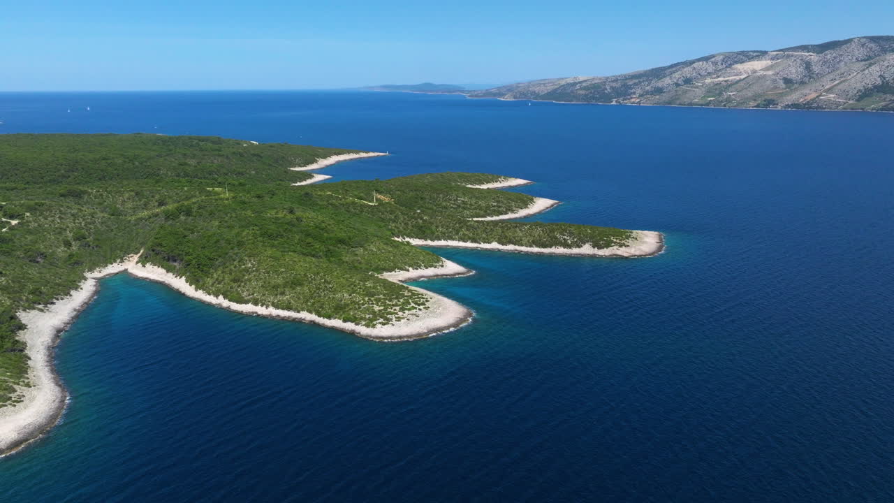 Forested Island Of Pakleni In Daytime In The Adriatic Sea, Croatia. - aerial shot