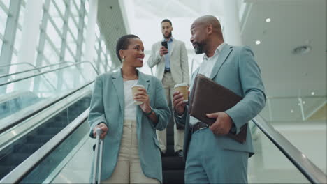 Business-people,-talking-and-travel-on-escalator