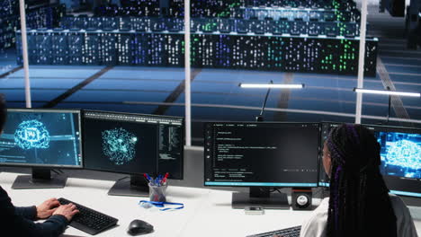 technicians in data center review ai diagnostics, analyzing neural networks