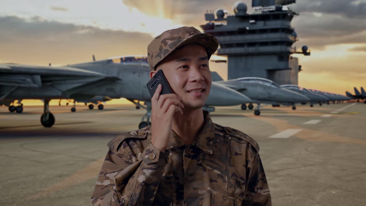 Soldier on Aircraft Carrier Deck Talking on Phone