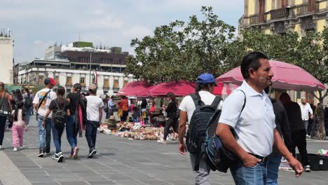bustling streets of mexico city on a summer day, teeming with people reveling in urban landscape