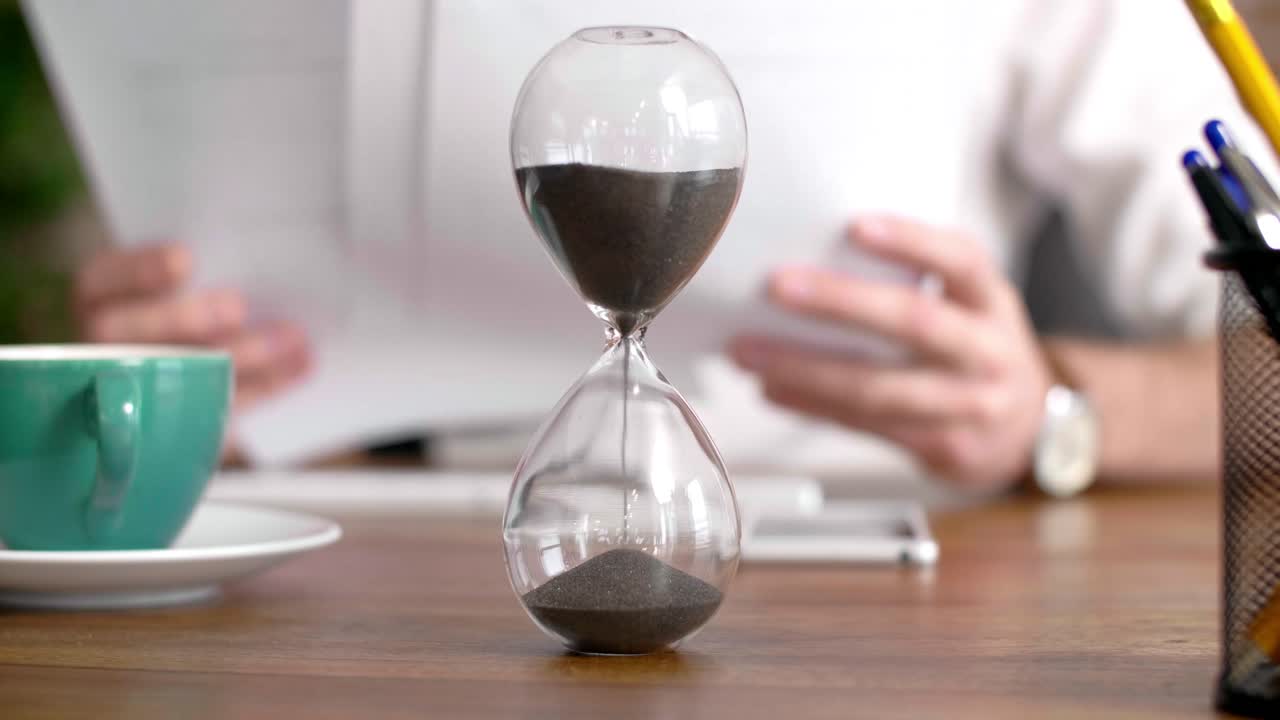 Front view of hourglass with sand