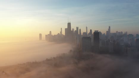 Chicago-foggy-aerial-footage-from-a-drone-top-view-gold-coast,-north-ave-beach