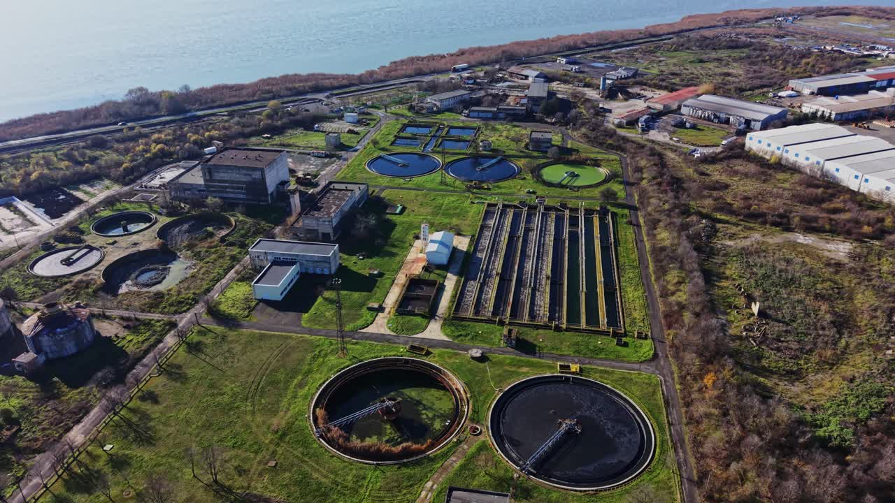 Wastewater treatment facility near water body with industrial area