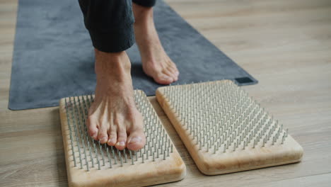 foot reflexology practice on wooden board