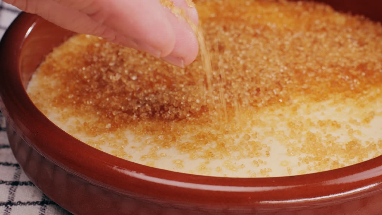 Spanish traditional food, catalonian dessert, crema catalana, catalan cream, spanish dessert close up, cooking.