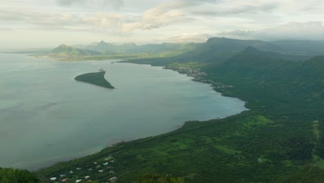 drone showing the lagoon behind le morne brabant revealing the mountain