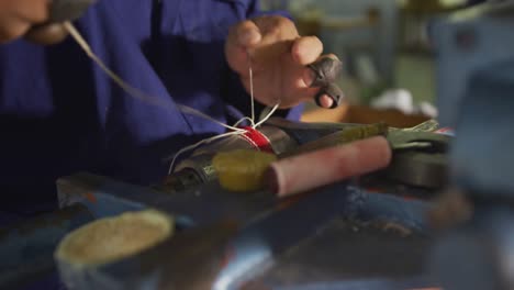 mixed race man working in factory