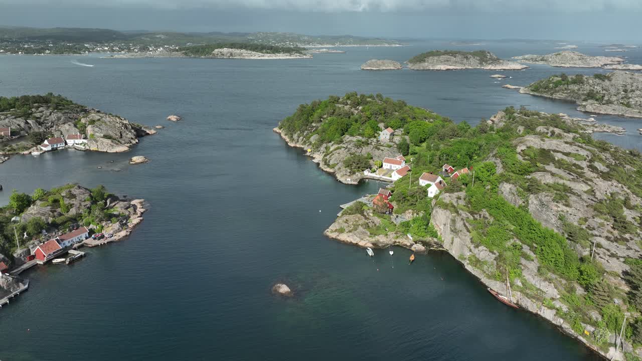 Bird’s-eye view of Ny-Hellesund’s traditional homes and rocky terrain.
