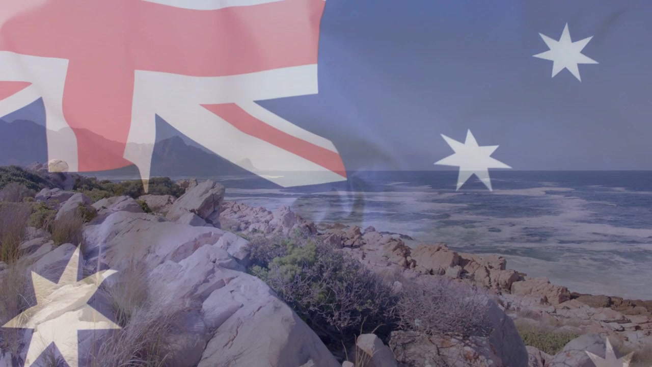 Ved start blafrer det australske flagget over en steinete odde, avslører kystlinjen og symboliserer identitet