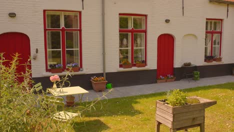 Detail-of-doors-and-windows-of-typical-Asylum-in-Bruges,-Almshouse-Spanoghe