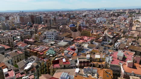 dense houses and old buildings in the historic center of valencia in spain - aerial drone shot