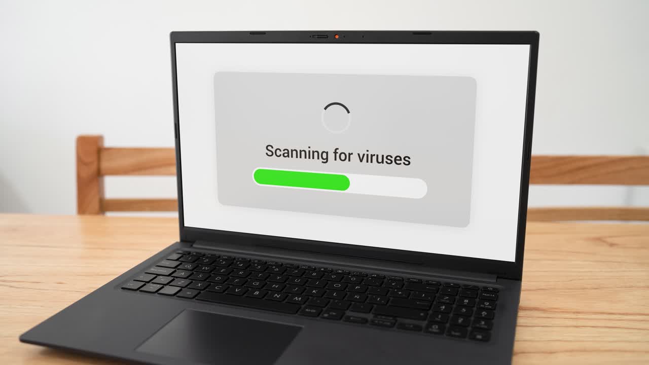 Doing a virus scan on personal laptop. Concept of looking for malware and spyware.