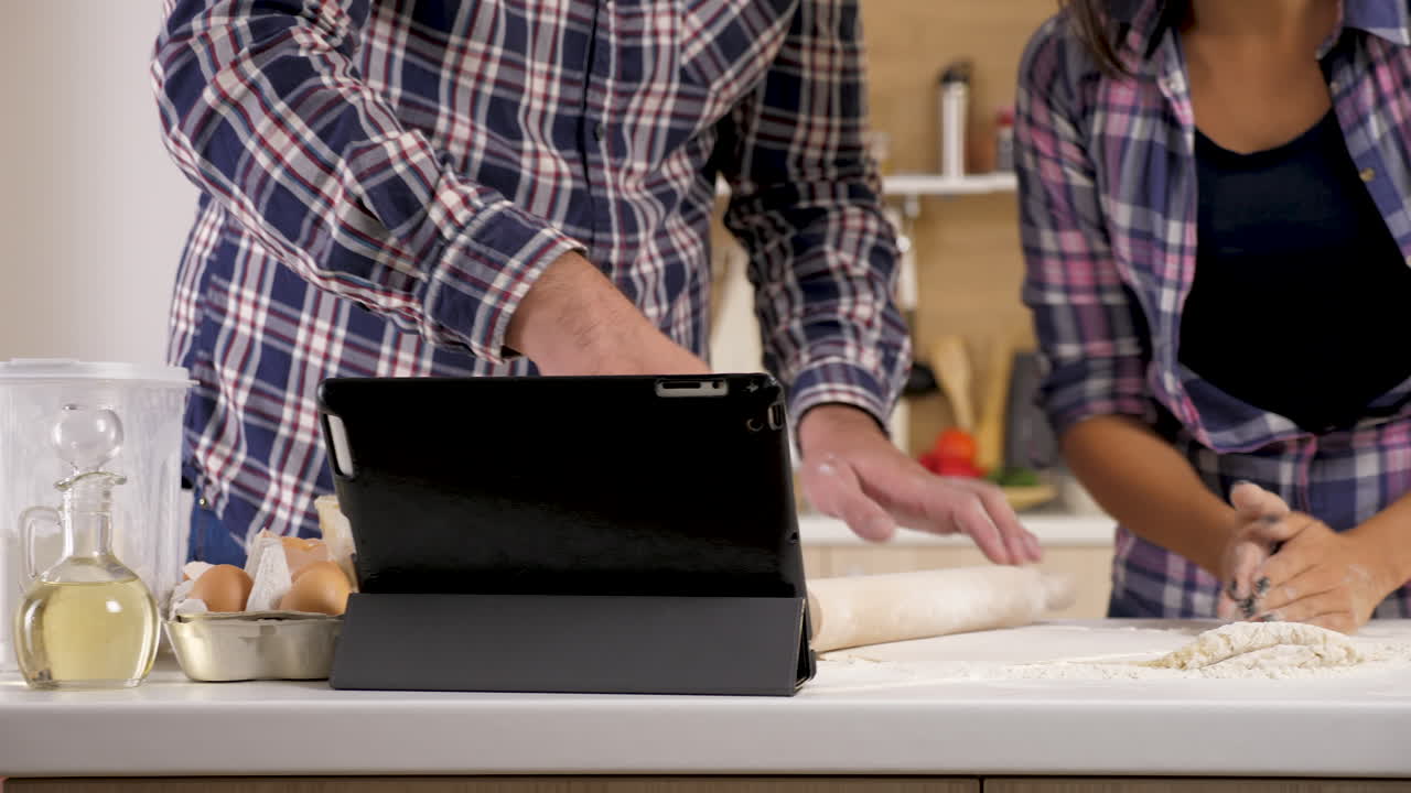 Couple Baking Together in the Kitchen