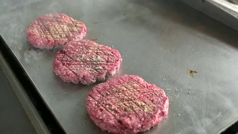 grilling hamburger cutlets cooking in kitchen